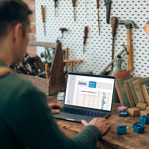 Small business owner reviewing online payments dashboard