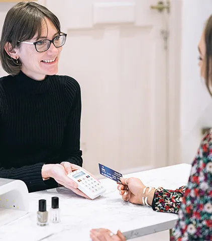 In store card payment taking place at a checkout counter